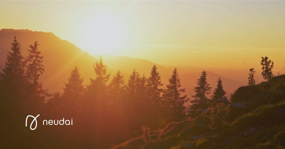 Mountain landscape with neudai logo